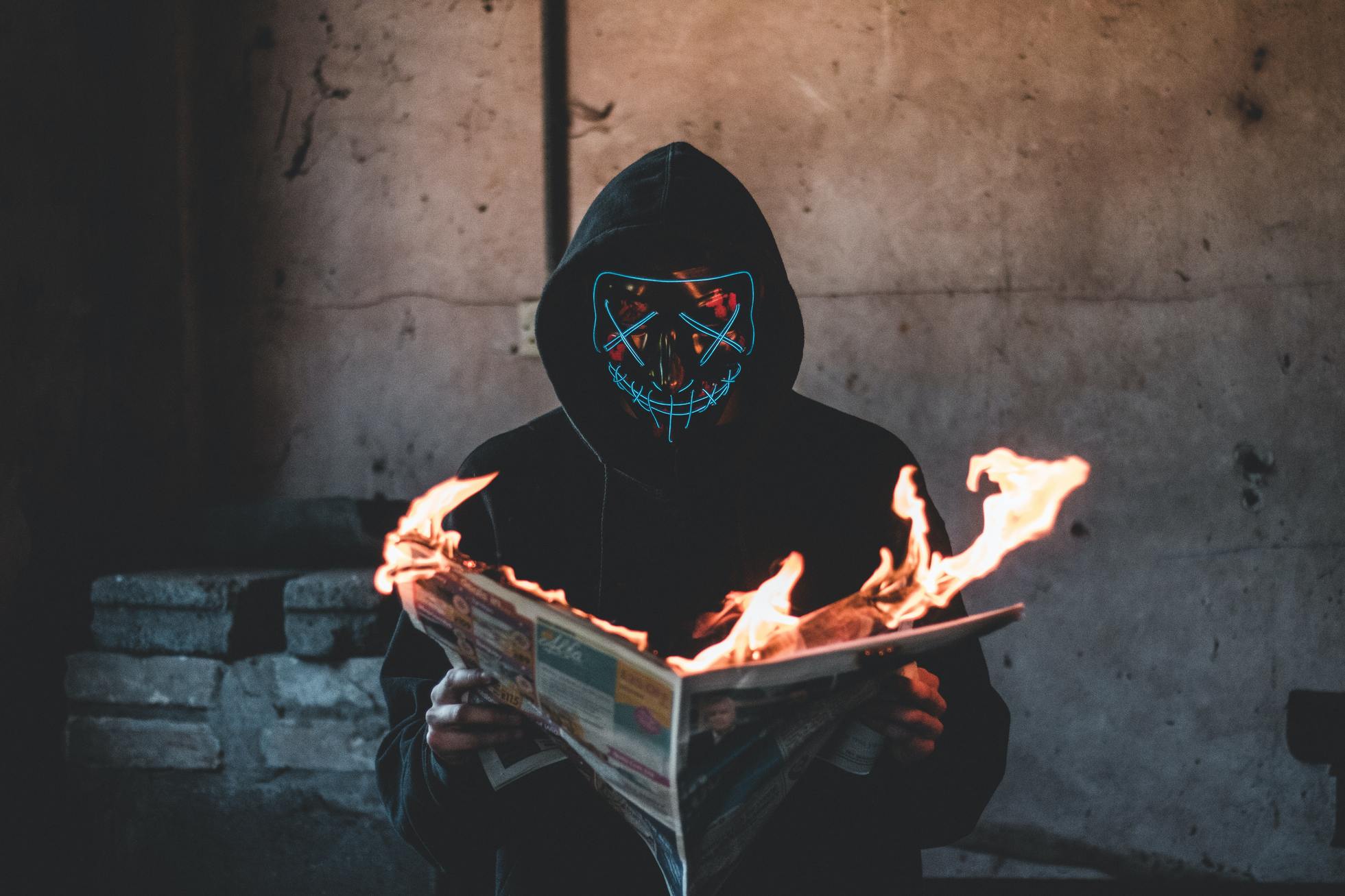 newspaper burning pexels-connor-danylenko-2538122